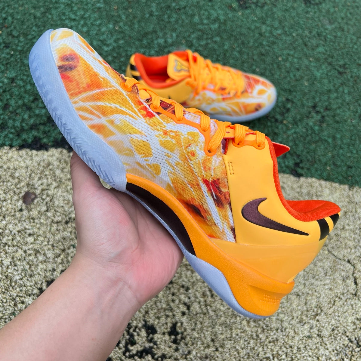 Nike Kobe 8 Protro Shanghai Fireworks basketball shoes in black and red with intricate firework-inspired design.