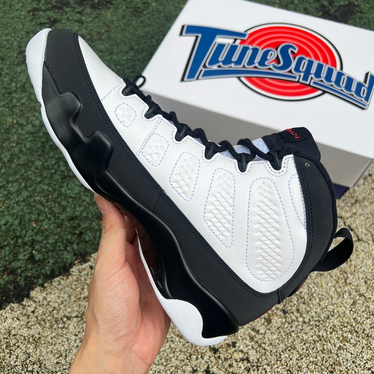 Nike Air Jordan 9 Retro OG Space Jam sneakers, black and blue colorway, with Jumpman logo and retro basketball design.