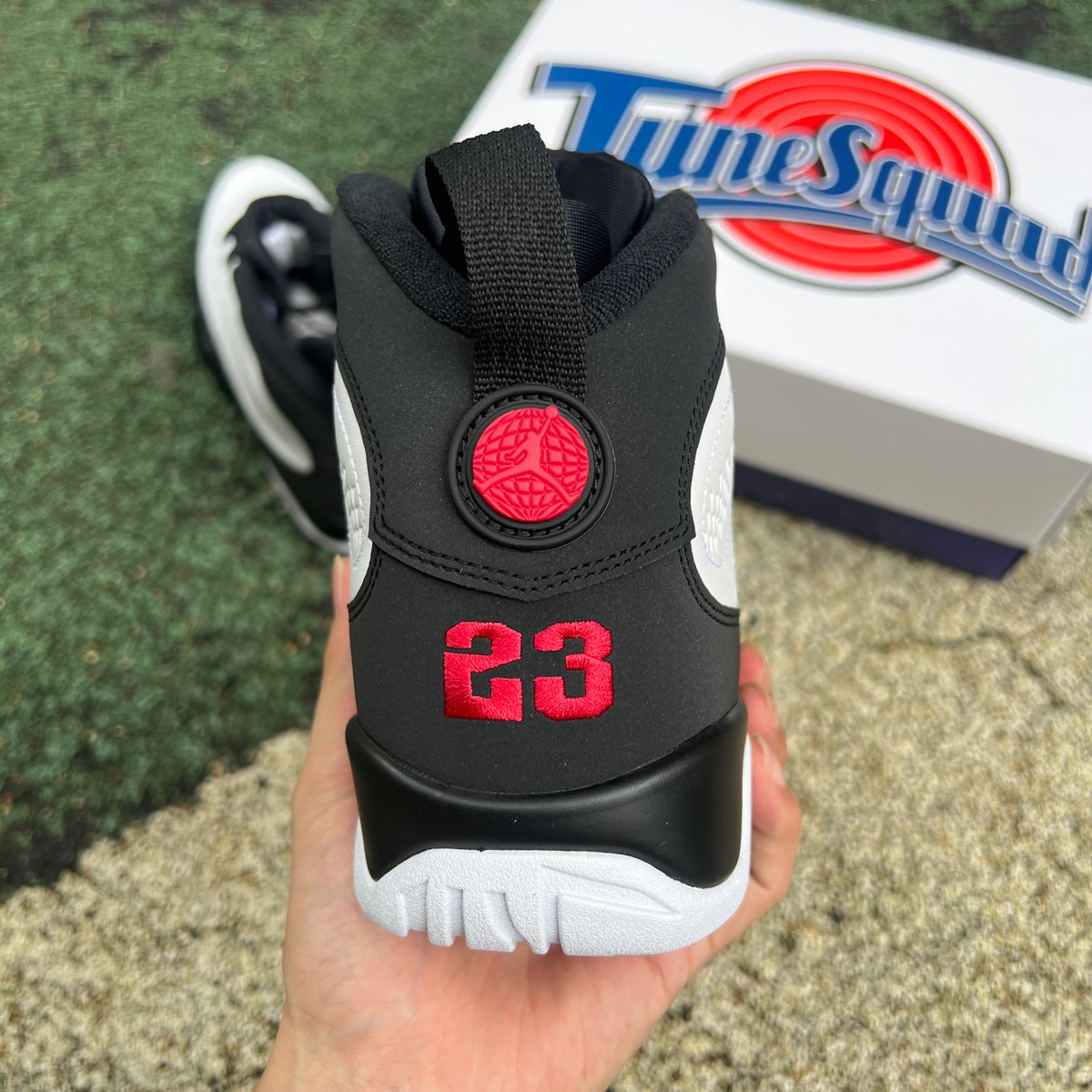 Nike Air Jordan 9 Retro OG Space Jam sneakers, featuring black, blue, and white colorway with Jumpman logo and classic design details.