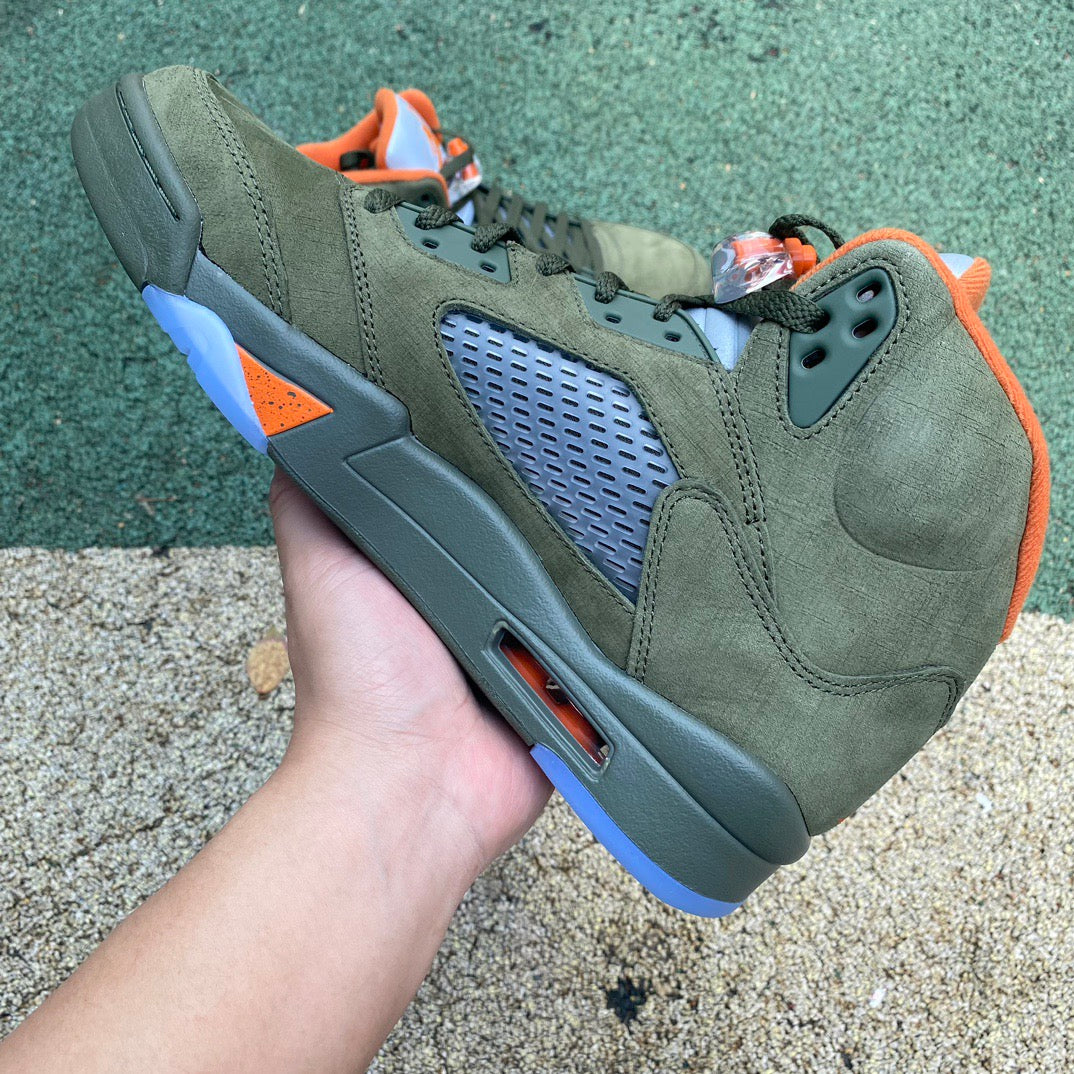 Nike Air Jordan 5 Retro Olive sneakers in black and green with detailed design elements and white sole.