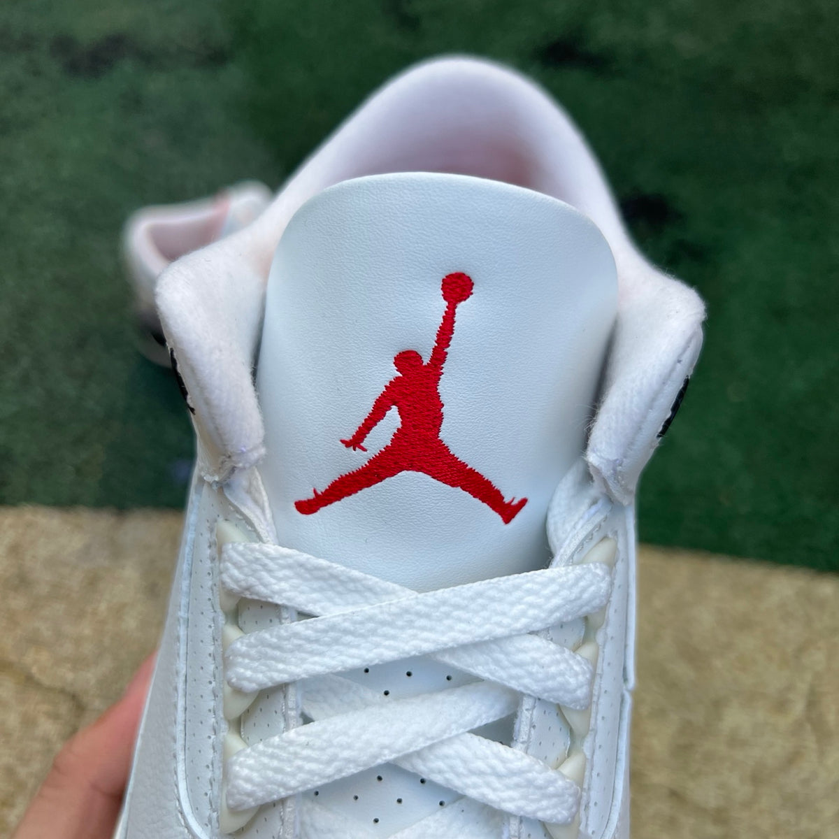 Nike Air Jordan 3 Retro White Cement Reimagined kids' basketball shoes featuring white leather and iconic grey cement accents.