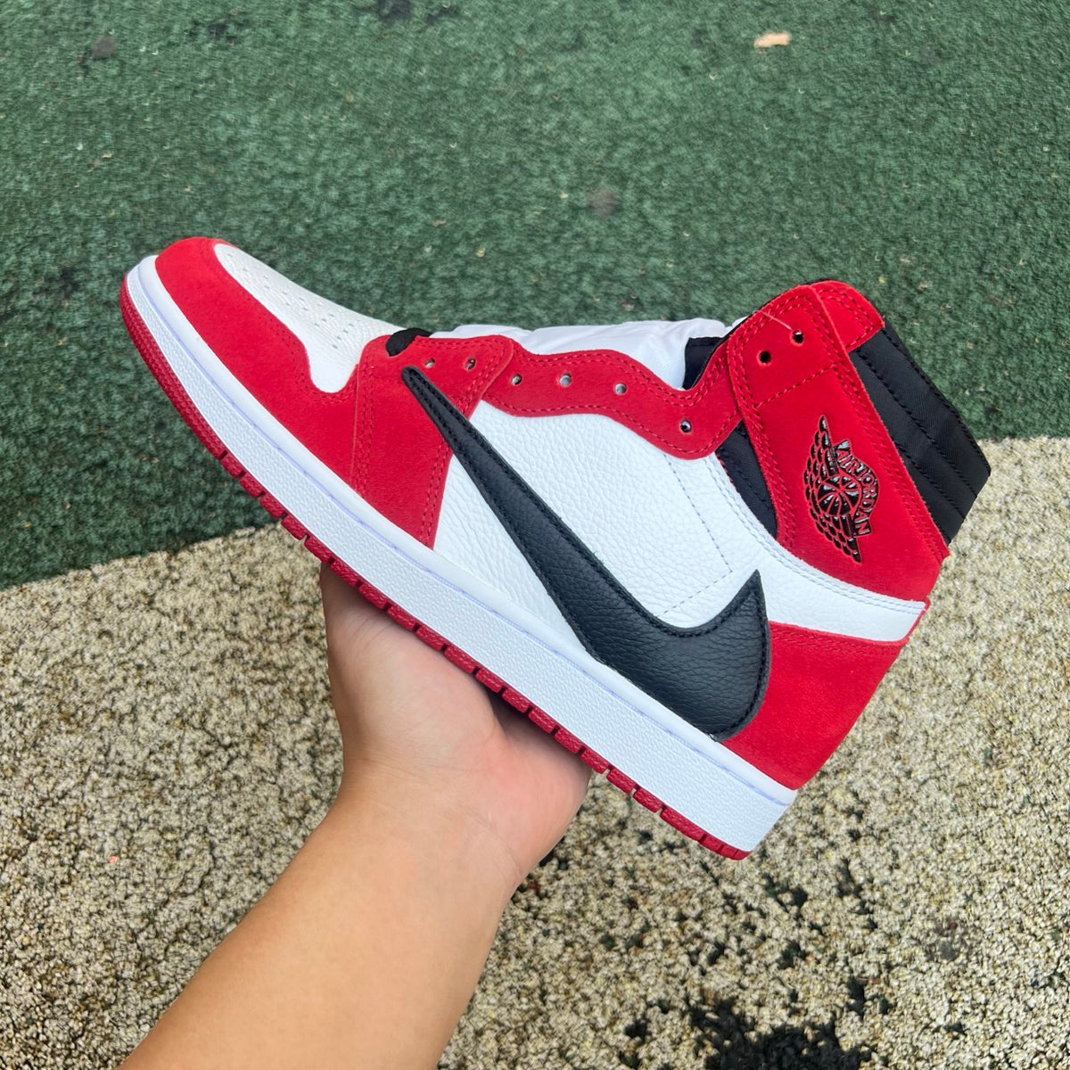 Nike Air Jordan 1 Retro High OG SP Fragment x Travis Scott sneaker in black and brown with signature design details.