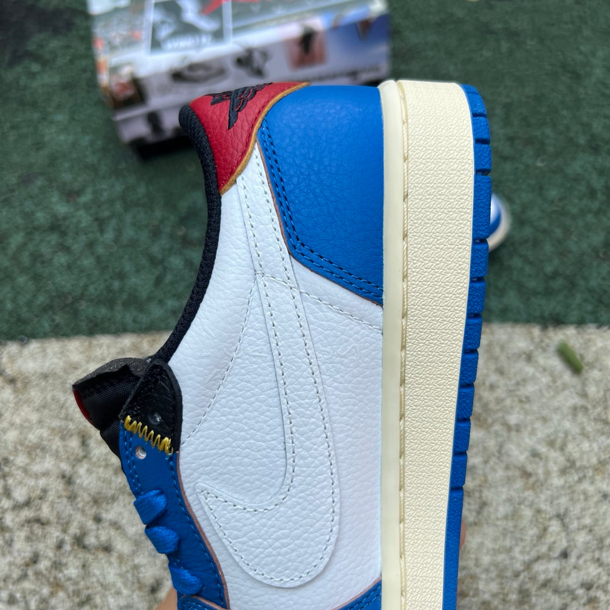 Nike Air Jordan 1 Retro Low OG SP Union LA x Travis Scott sneakers, featuring black and white colorway and signature design details.