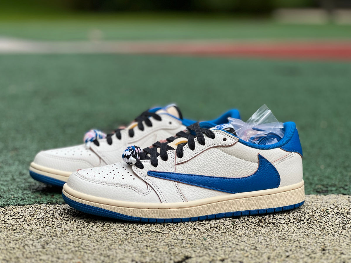Nike Air Jordan 1 Retro Low OG SP Fragment x Travis Scott sneakers in Sail and Military Blue, showcasing the collaboration design.