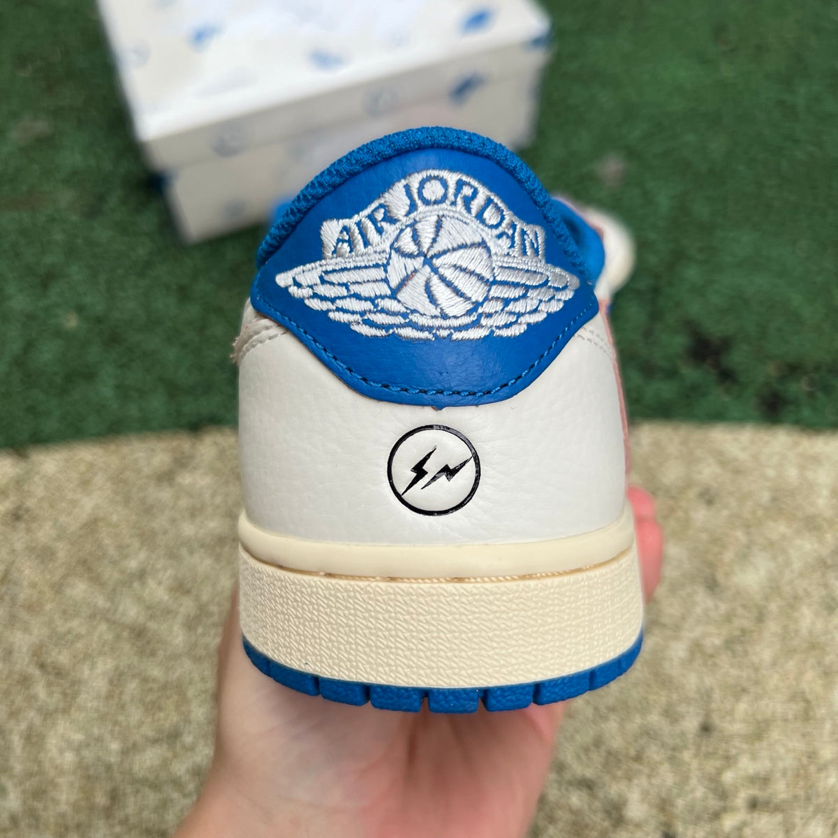 Nike Air Jordan 1 Retro Low OG SP Fragment x Travis Scott sneakers in Sail and Military Blue with white accents