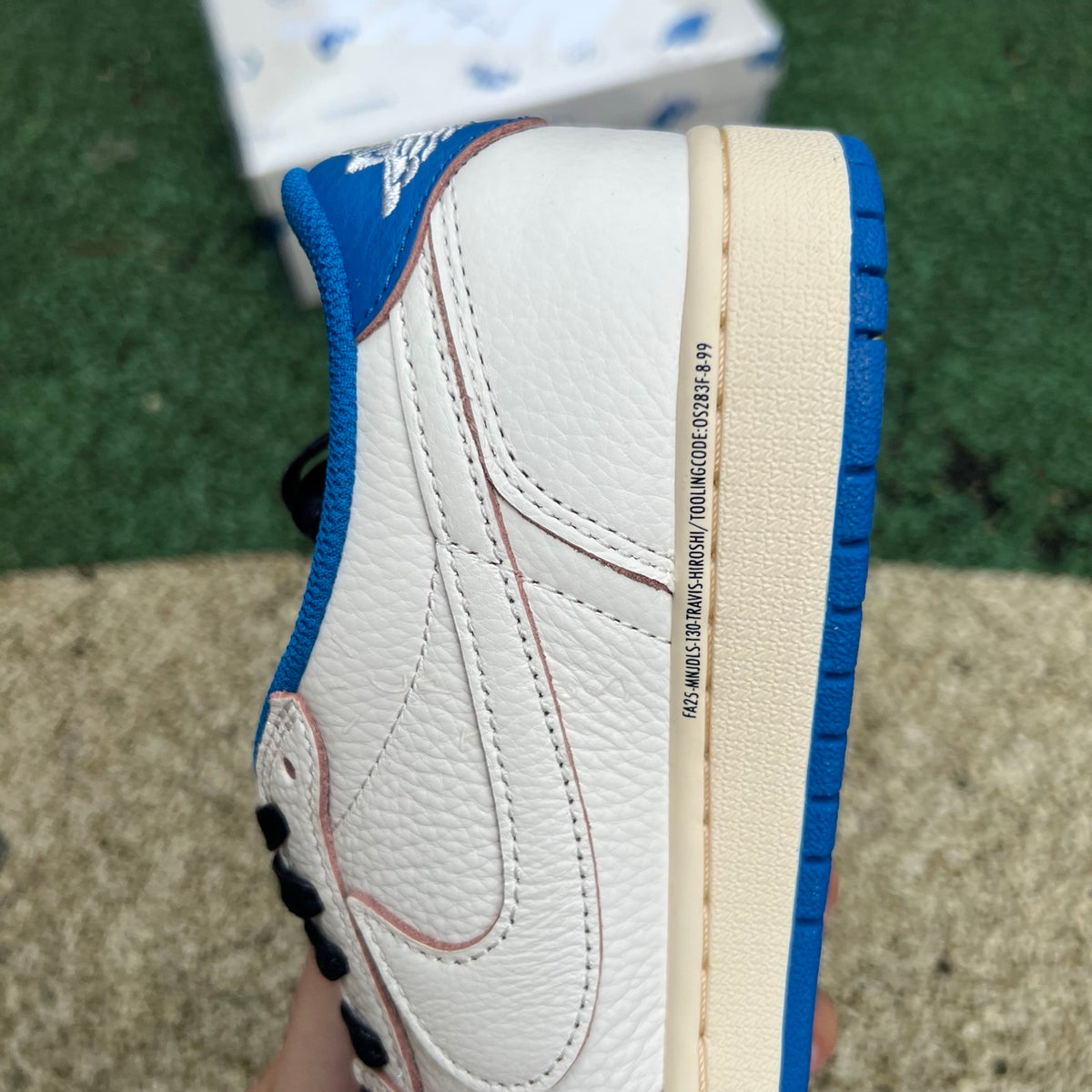 Nike Air Jordan 1 Retro Low OG SP Fragment x Travis Scott sneakers in Sail and Military Blue, featuring signature design details.