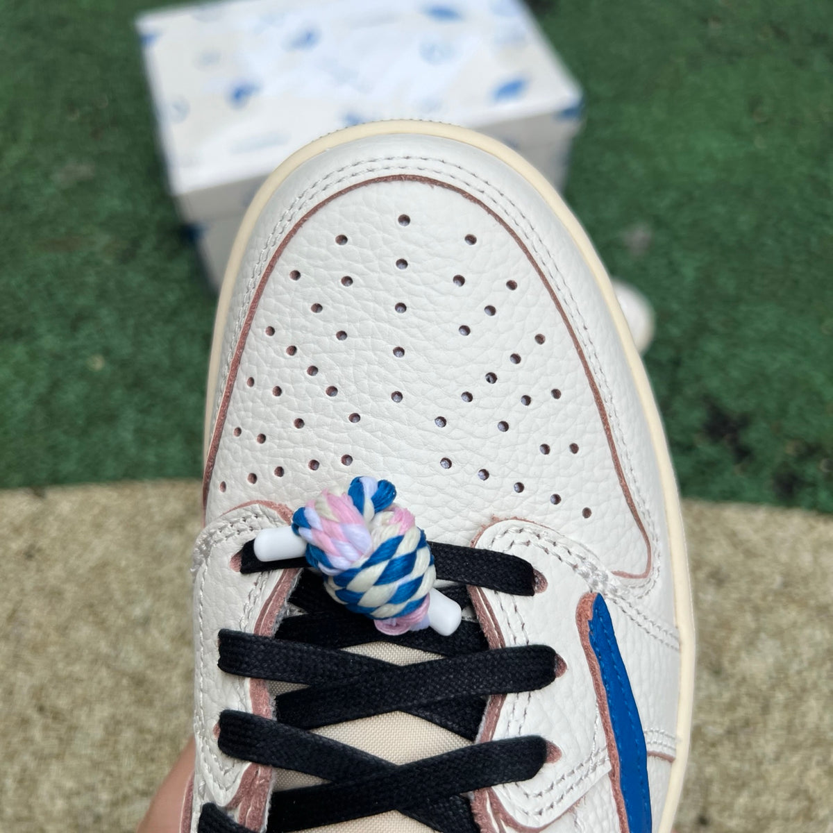 Nike Air Jordan 1 Retro Low OG SP Fragment x Travis Scott sneakers in Sail and Military Blue with Nike x Jordan branding