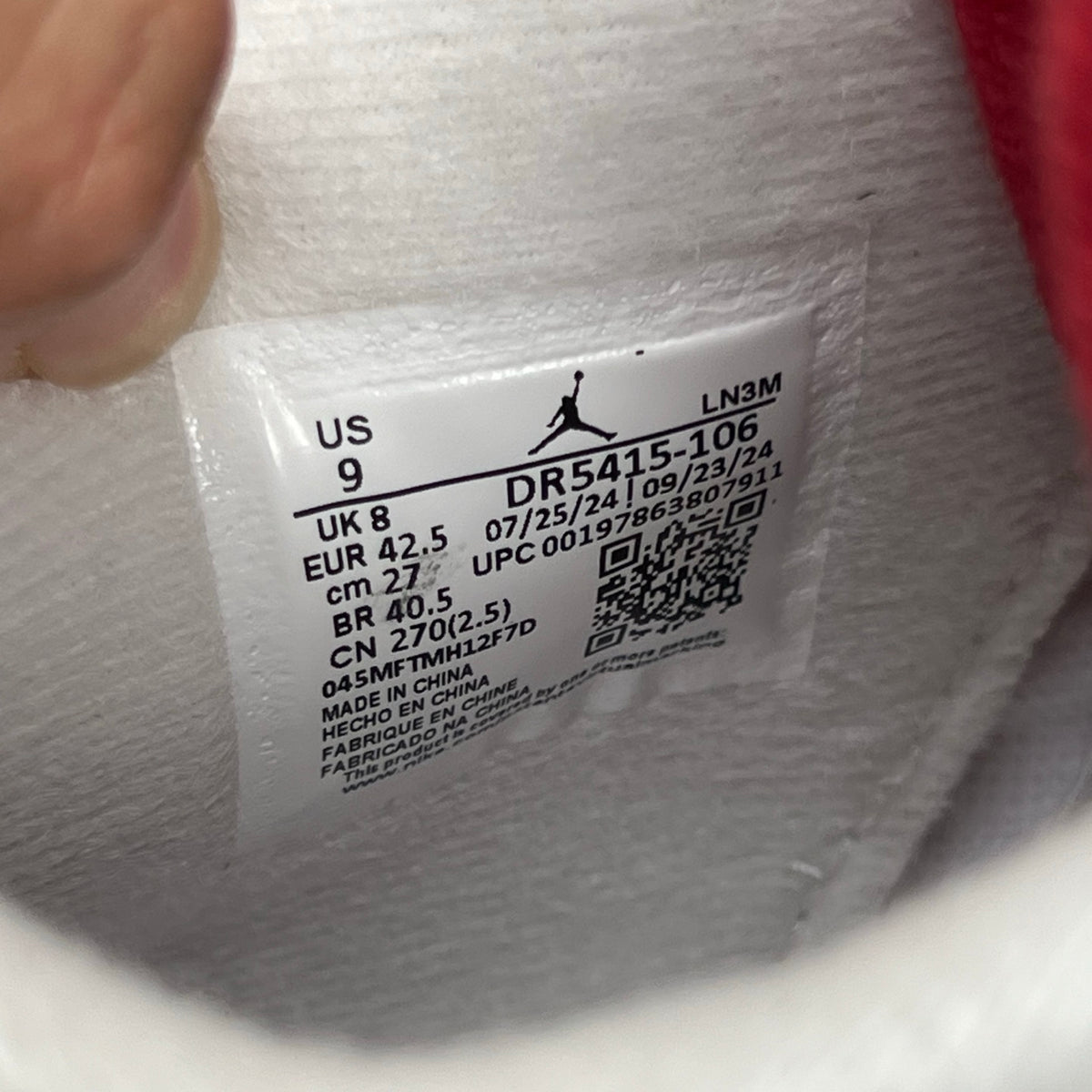 Nike Air Jordan 4 Retro SB Varsity Red sneakers with white and red colorway, featuring classic design and Nike branding.