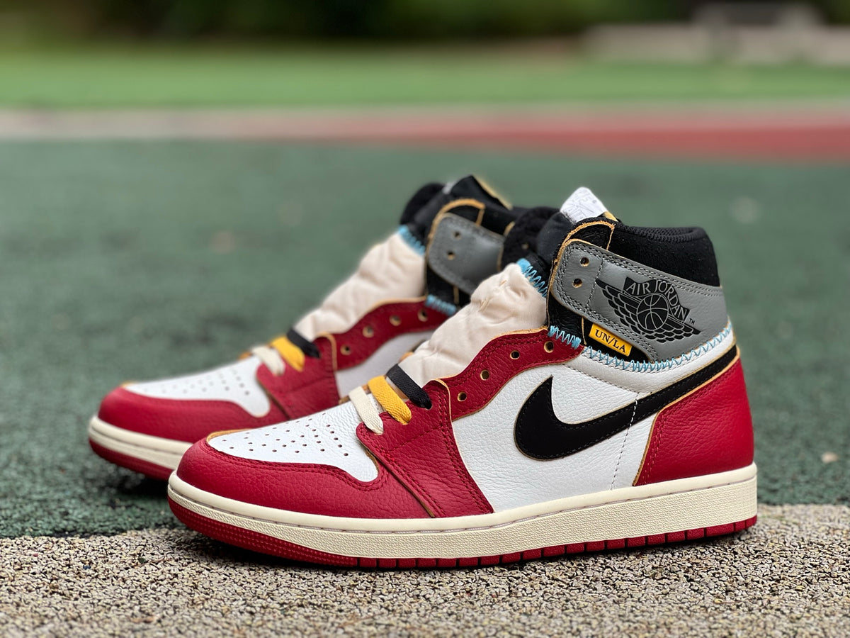 Nike Air Jordan 1 Retro High OG SP Union LA Chicago Shadow sneakers in black, red, and grey leather with high-top design.