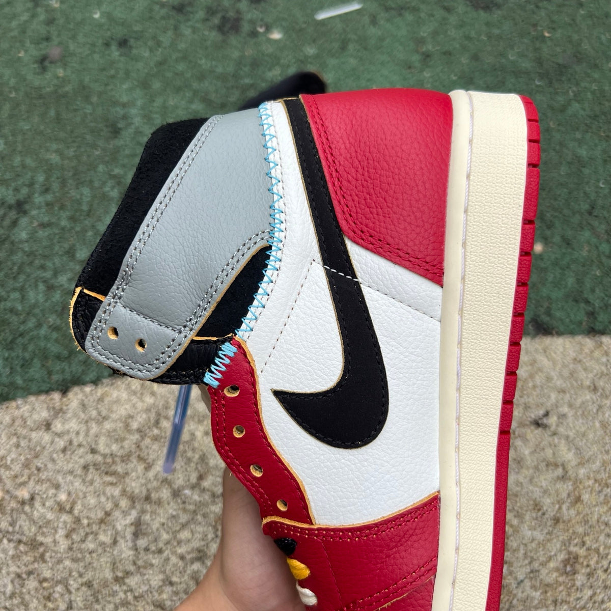 Nike Air Jordan 1 Retro High OG SP Union LA Chicago Shadow sneakers, featuring a black and grey colorway with stylish design details