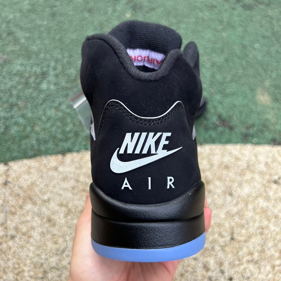 Nike Air Jordan 5 Retro OG Black Metallic sneakers, showing the classic design with black and metallic accents.