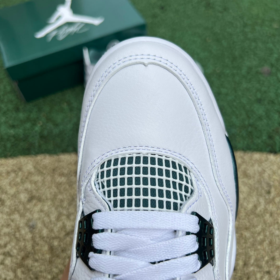 Nike Air Jordan 4 Retro Oxidized Green sneaker with white and green accents, featuring classic design details.