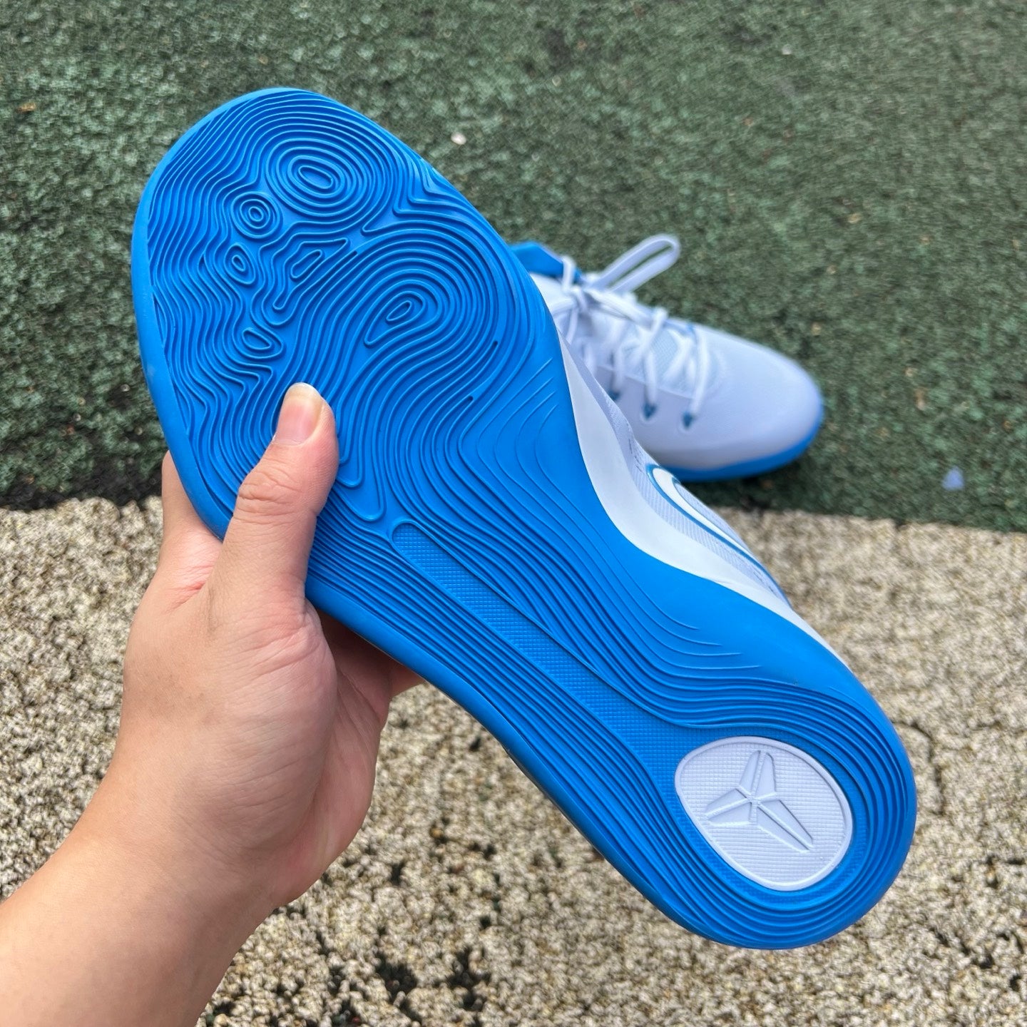 Nike Kobe 9 EM Low Protro basketball shoes in Hydrogen Blue, featuring sleek design and low-top style by Nike x Jordan.