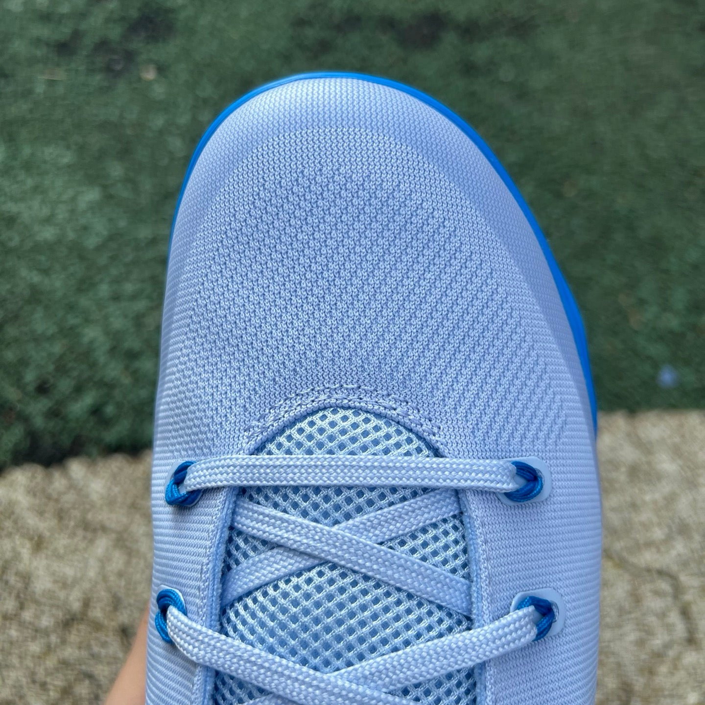 Nike Kobe 9 EM Low Protro basketball shoes in Hydrogen Blue, featuring low-top design and Nike x Jordan branding.