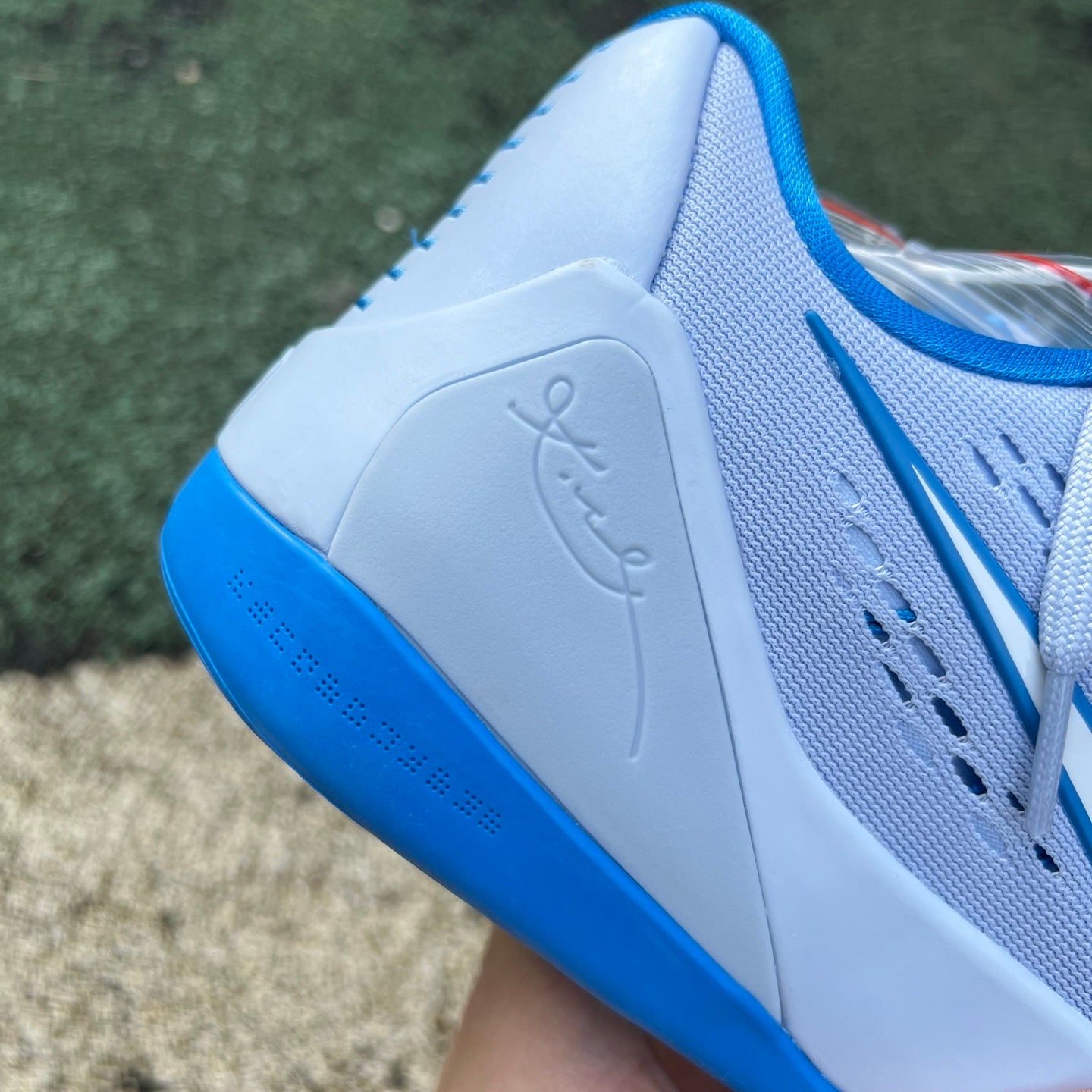 Nike Kobe 9 EM Low Protro TB Hydrogen Blue basketball shoes featuring blue and black design, Nike x Jordan collaboration.