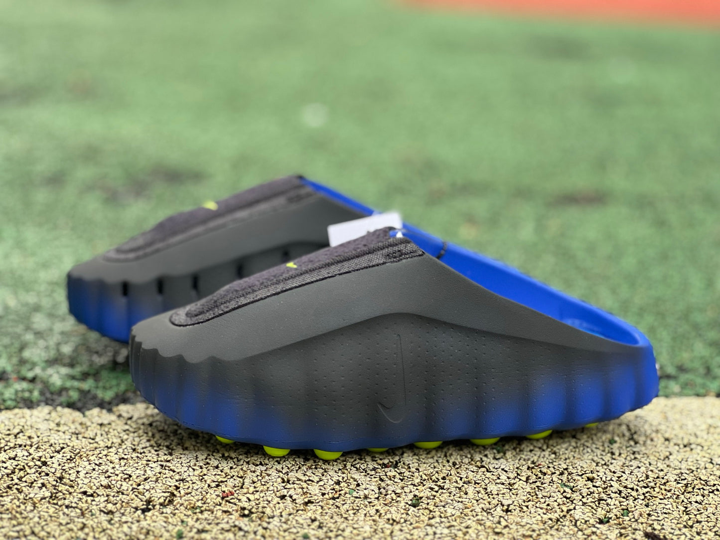 Nike Jordan Mind 001 Flyknit Slide in Hyper Royal and Black featuring a comfortable slip-on design and Nike branding.