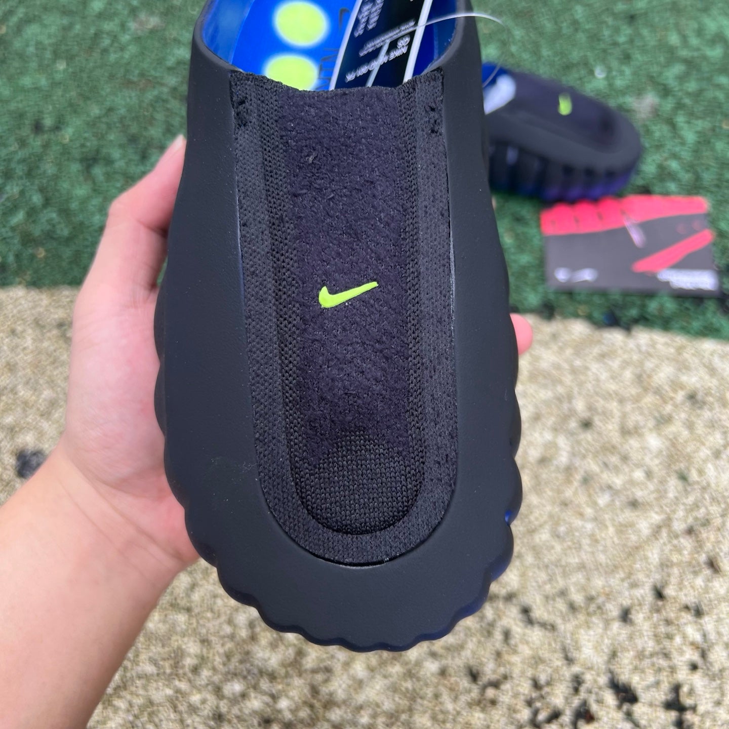 Nike x Jordan Mind 001 Flyknit Slide in Hyper Royal and Black, featuring a sleek slip-on design and breathable Flyknit material.