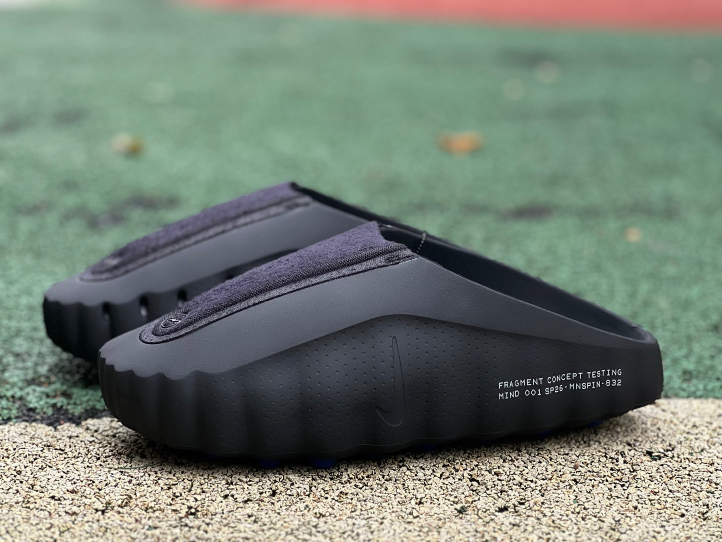 Nike x Jordan Mind 001 Slide in black featuring a sleek design and comfortable strap, ideal for casual wear.