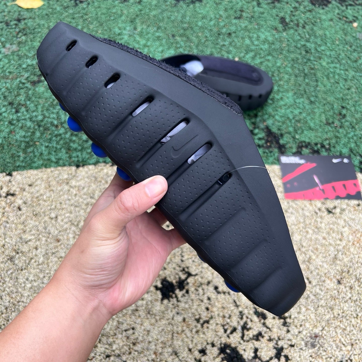 Nike x Jordan Mind 001 Slide in black with Nike and Jordan branding, featuring a comfortable open-toe design and casual style.
