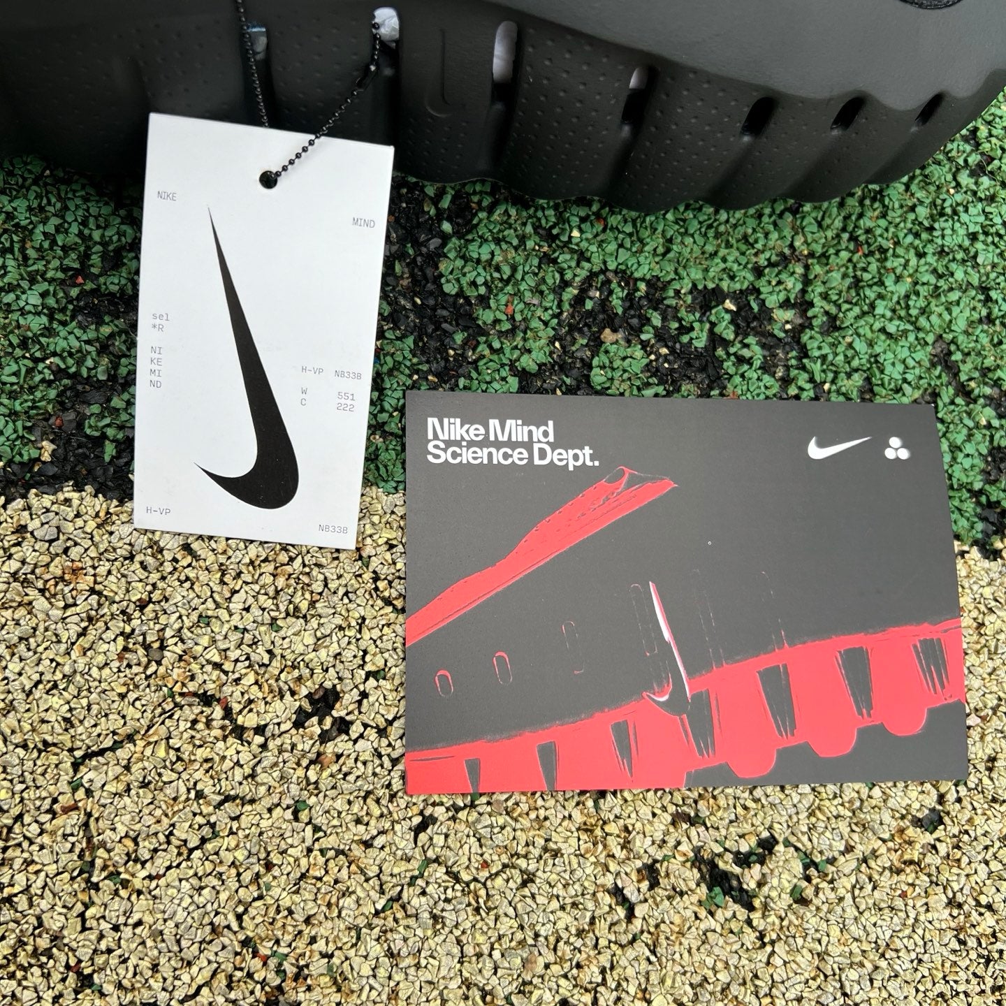 Nike x Jordan Mind 001 Slide in black with Nike and Jordan branding, featuring a cushioned sole and open-toe design.