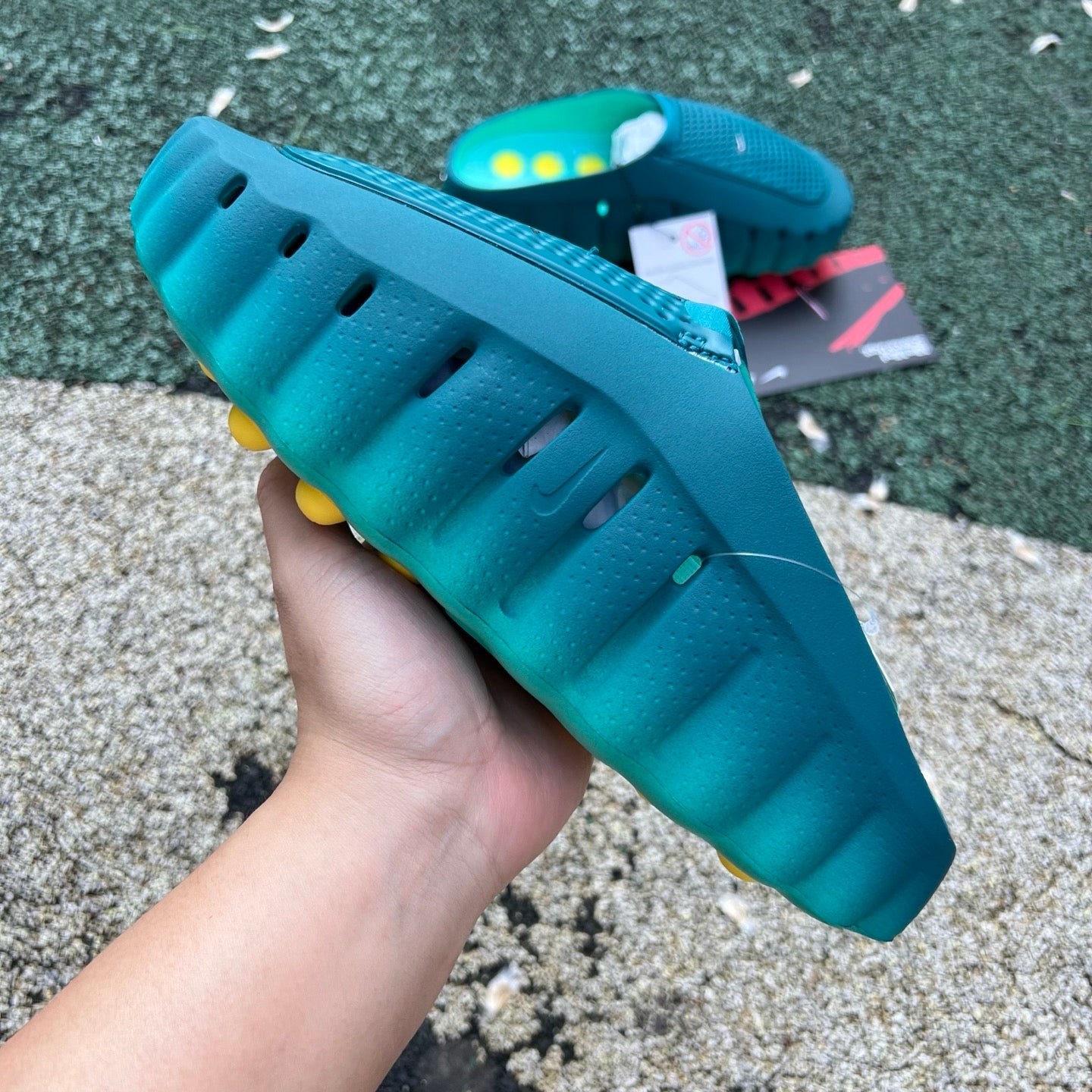 Nike Mind 001 slide in Geode Teal Light Menta with Nike x Jordan branding, featuring a comfortable slide design and sporty style.