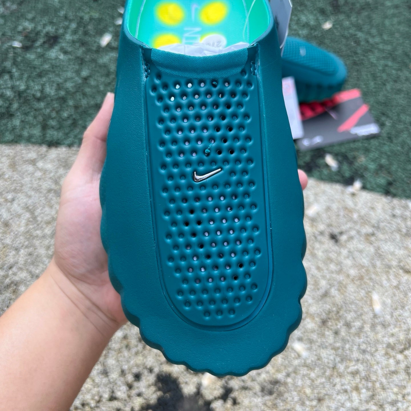 Nike x Jordan Mind 001 slide in Geode Teal and Light Menta, featuring a sleek design and cushioned sole for comfortable wear.