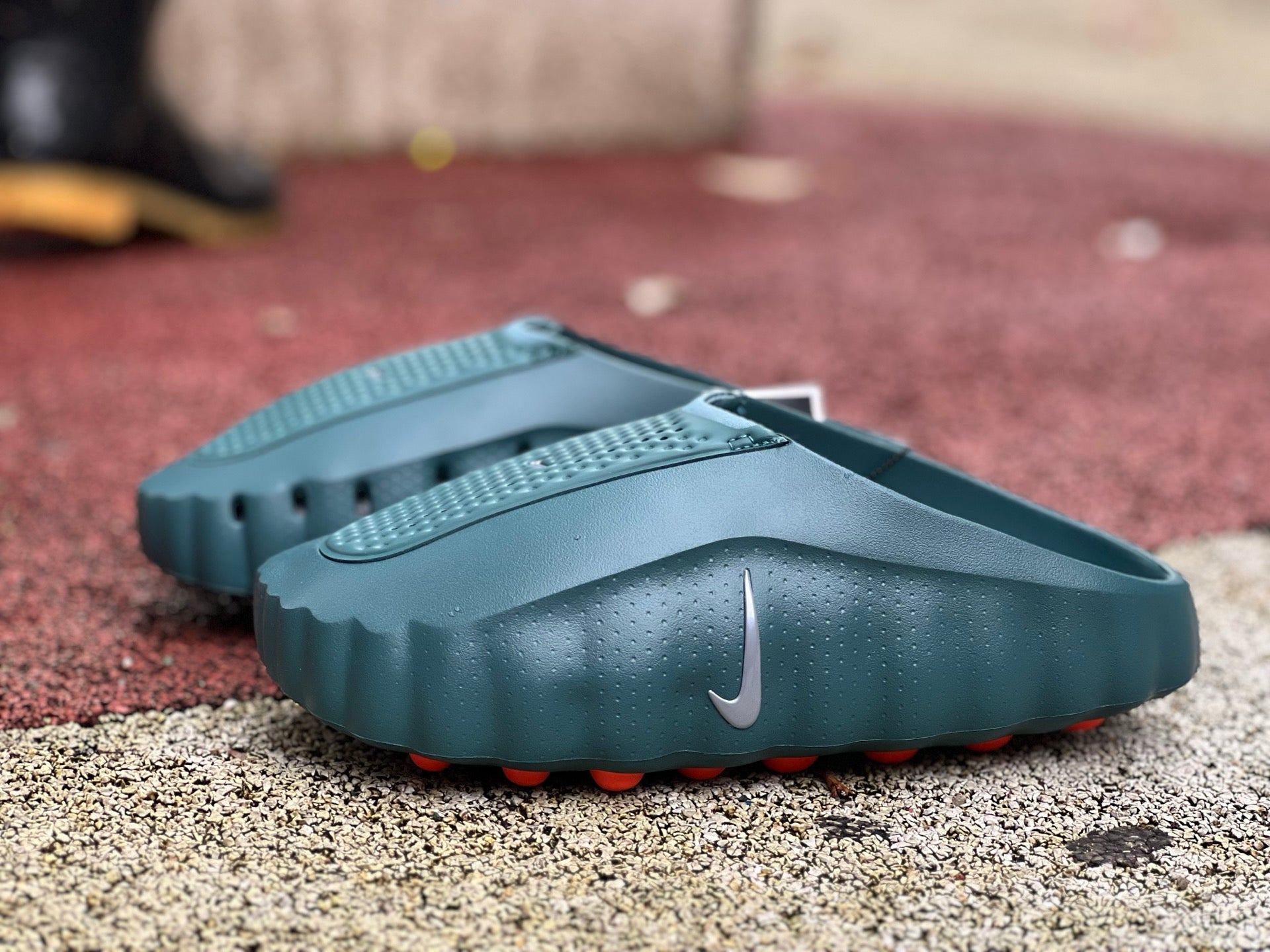 Nike x Jordan Mind 001 Slide in Mineral Slate with cushioned sole and open-toe design, perfect for casual wear.