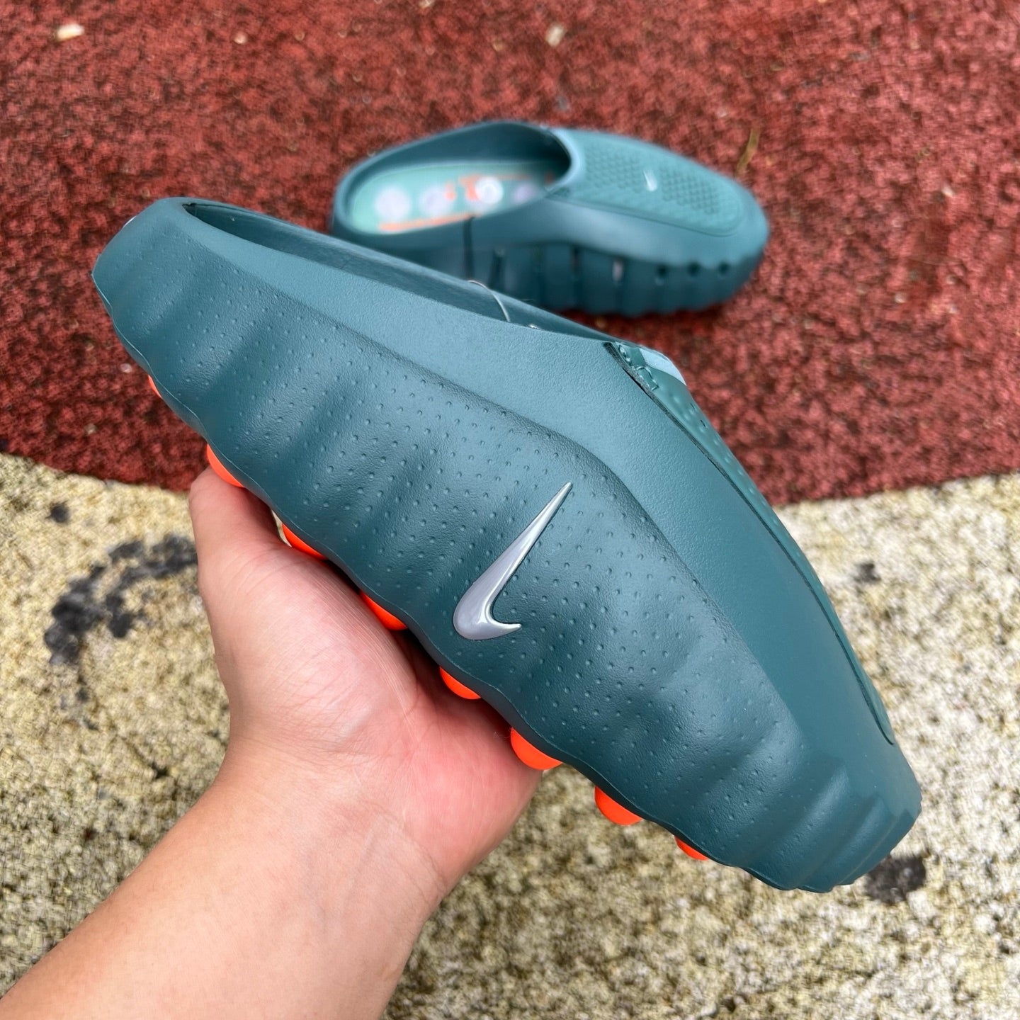 Nike x Jordan Mind 001 Slide in Mineral Slate with cushioned footbed and wide strap, shown from the front view.
