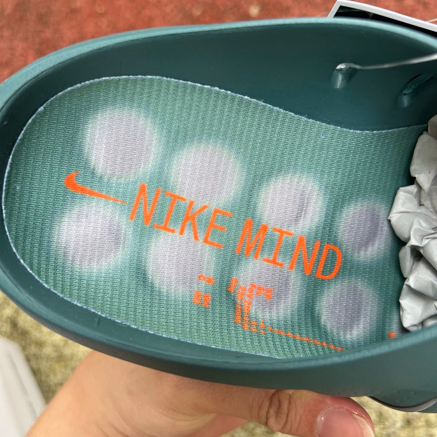 Nike x Jordan Mind 001 slide in Mineral Slate color, featuring a comfortable slide sandal with Nike and Jordan branding.