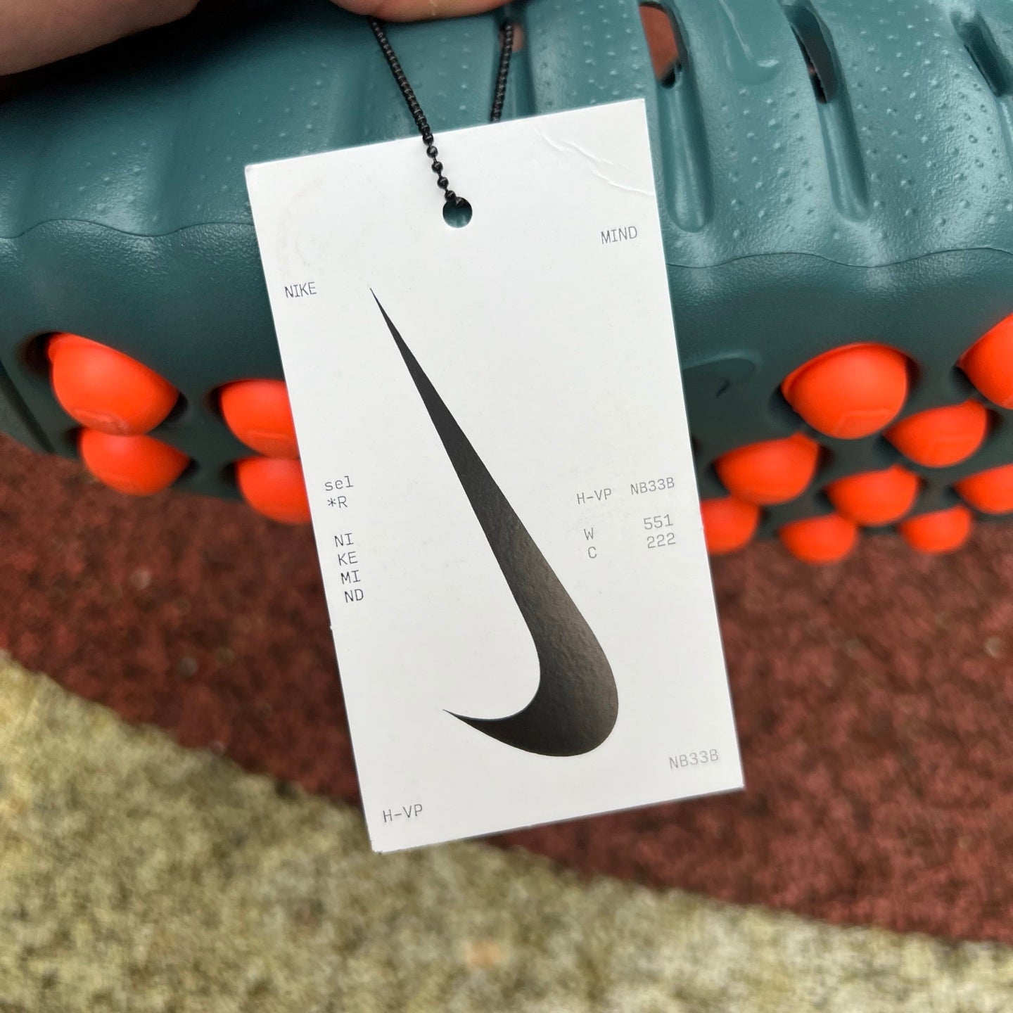 Nike x Jordan Mind 001 Slide in Mineral Slate, featuring black and grey design with Nike branding and comfortable slide style.
