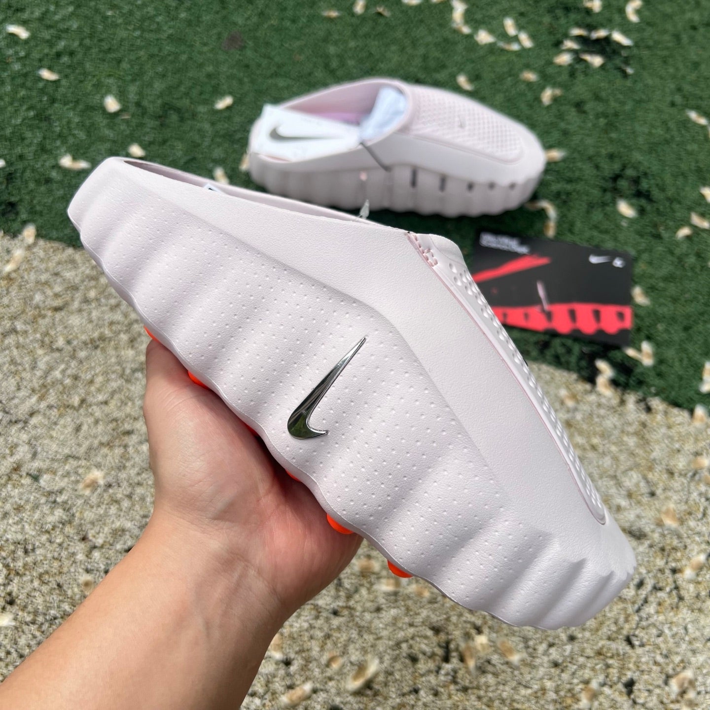 Nike x Jordan Mind 001 Slide in pearl pink with cushioned sole and strap, featuring Nike and Jordan branding.