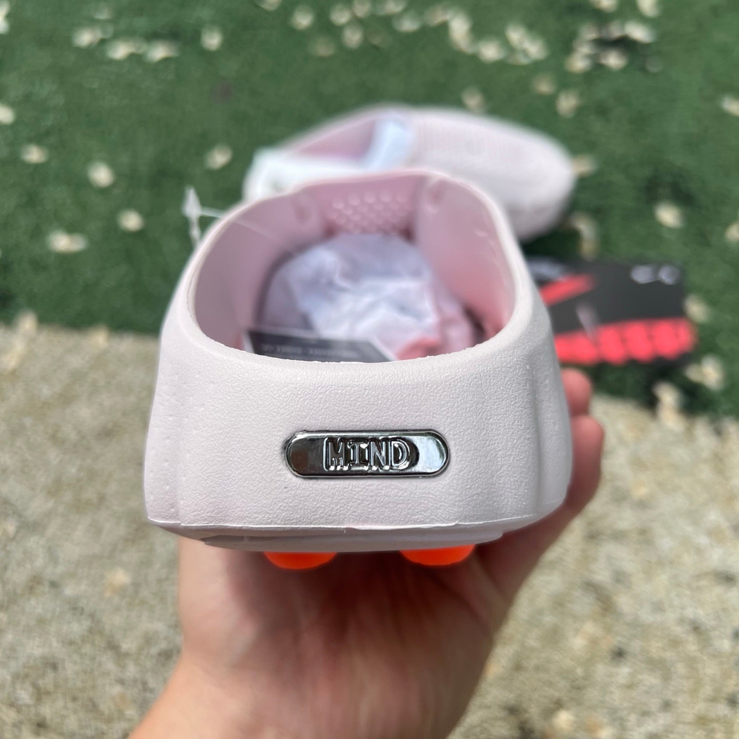 Nike x Jordan Mind 001 Slide in Pearl Pink, featuring cushioned straps and a sporty design for casual wear.
