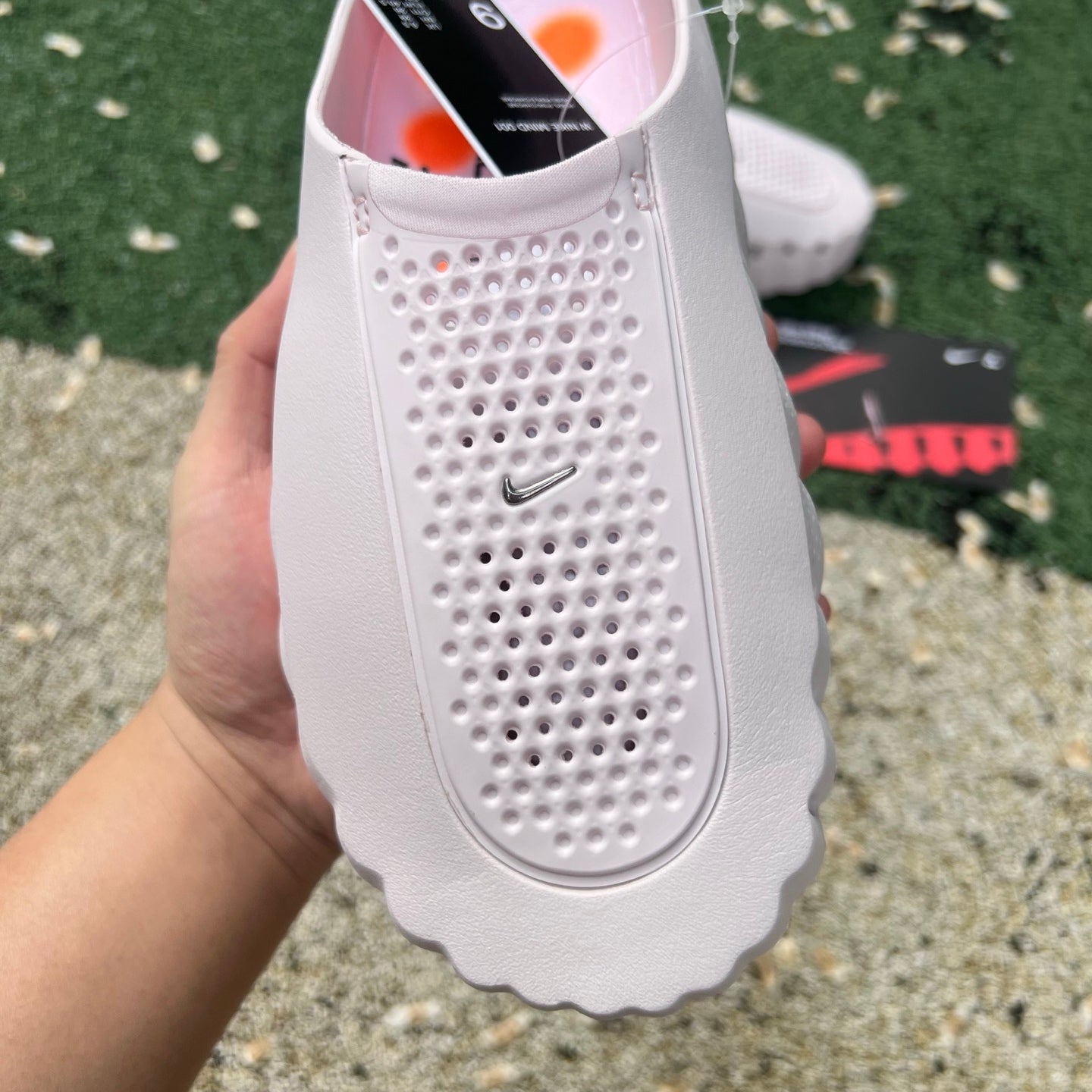 Nike x Jordan Mind 001 Slide in Pearl Pink, featuring a comfortable slip-on design with branded logo details.
