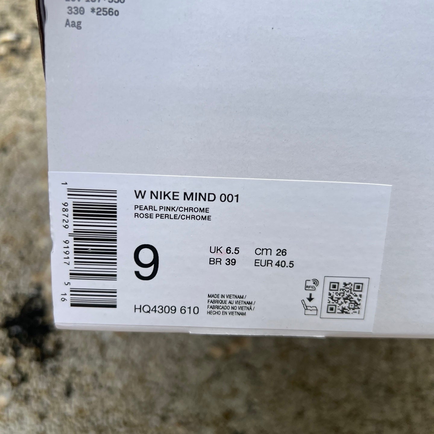 Nike x Jordan Mind 001 slide in Pearl Pink with sporty design, featuring Nike and Jordan branding on the strap.