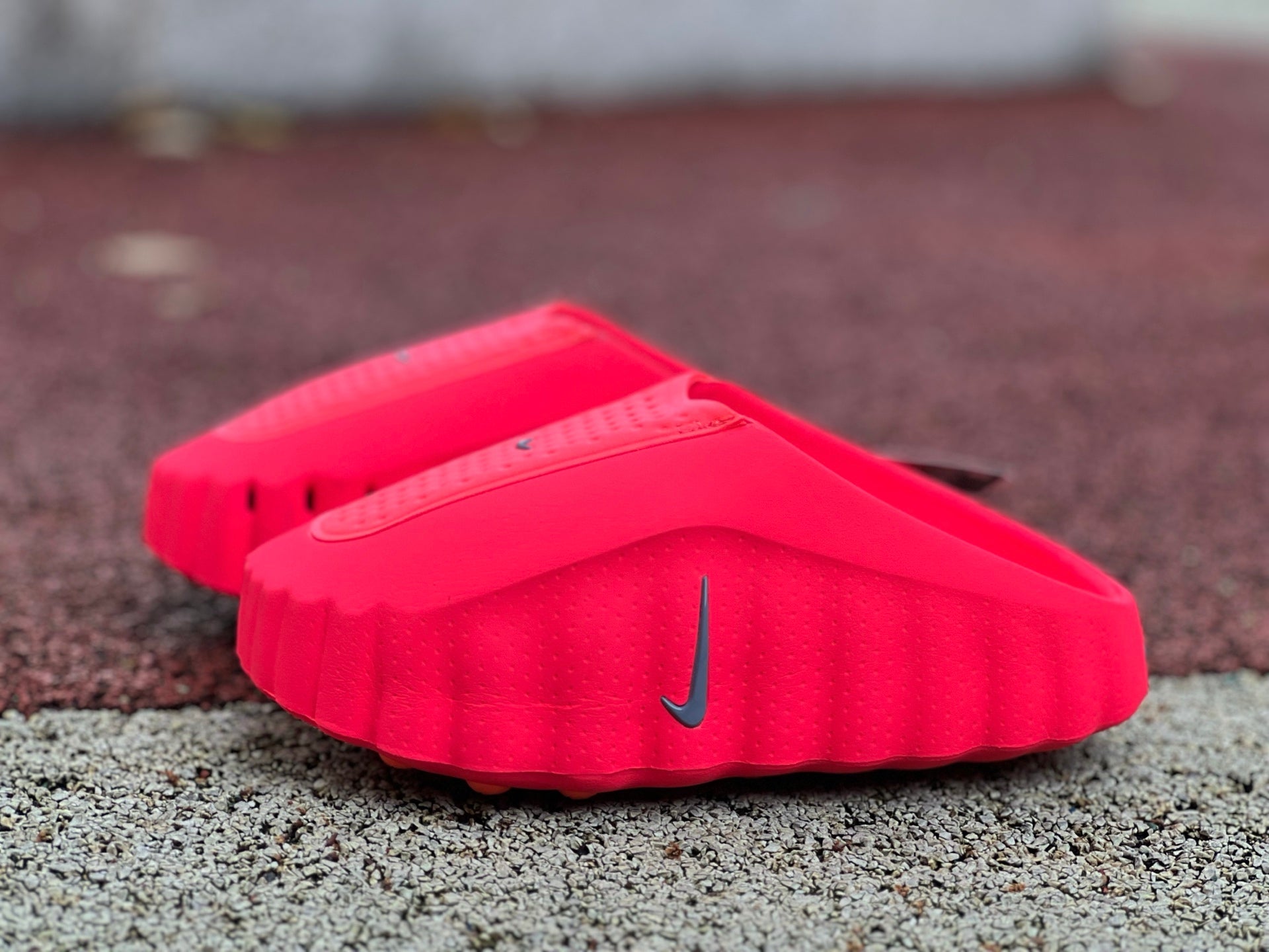 Nike x Jordan Mind 001 Solar Red slide sandal featuring bold red straps and a comfortable design.