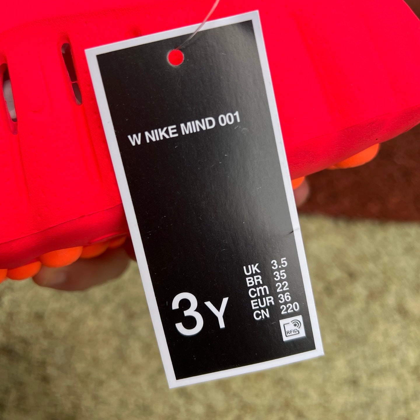 Nike x Jordan Mind 001 Solar Red slide sandal featuring a bold red strap and comfortable design.