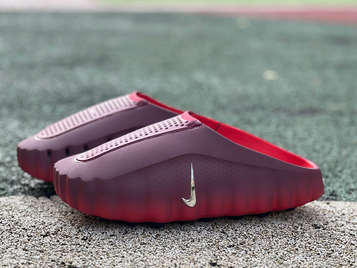 Nike x Jordan Mind 001 slide in team red and university red with Nike and Jordan branding, featuring a sporty open-toe design.