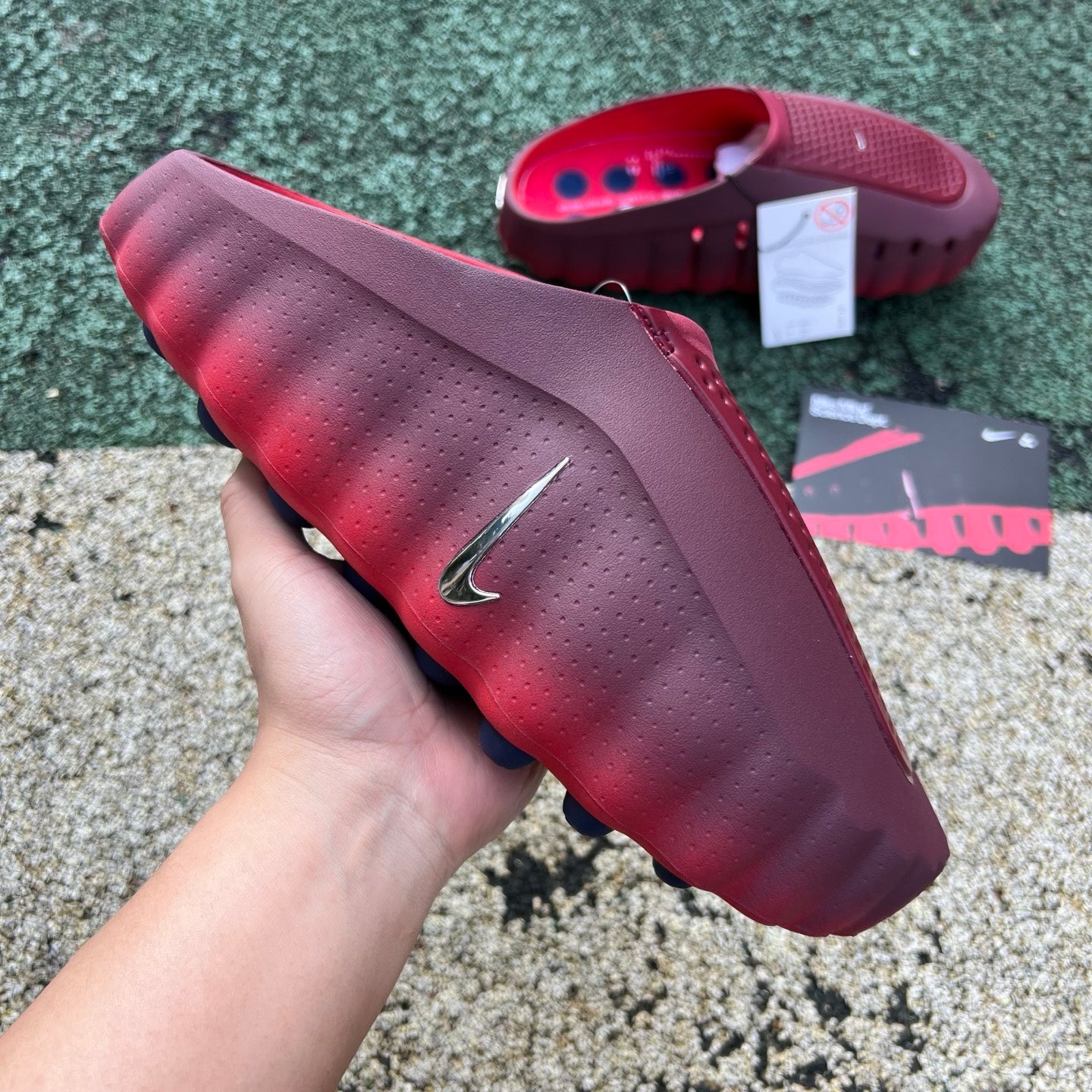Nike x Jordan Mind 001 Slide in Team Red and University Red with black accents and Nike logo on the strap.