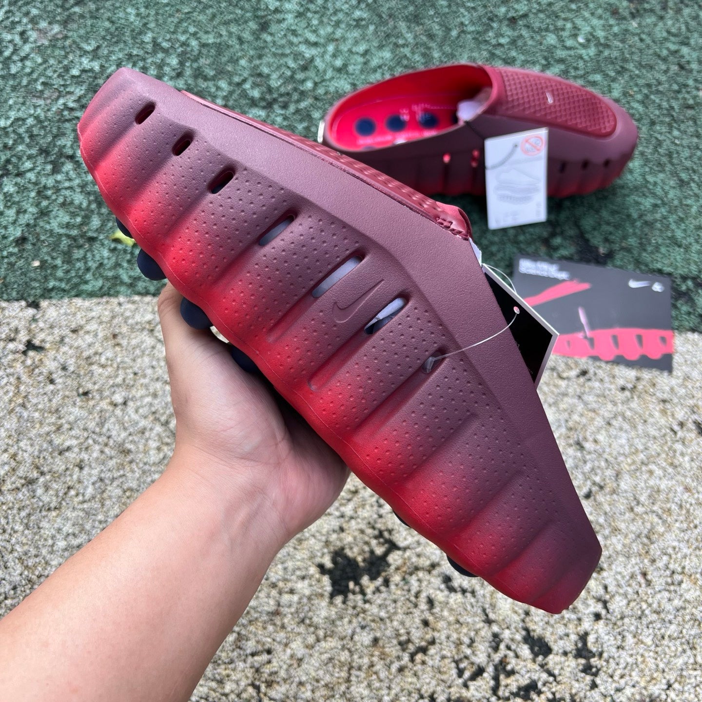 Nike x Jordan Mind 001 Slide in team red and university red with cushioned sole and open-toe design, perfect for casual wear.