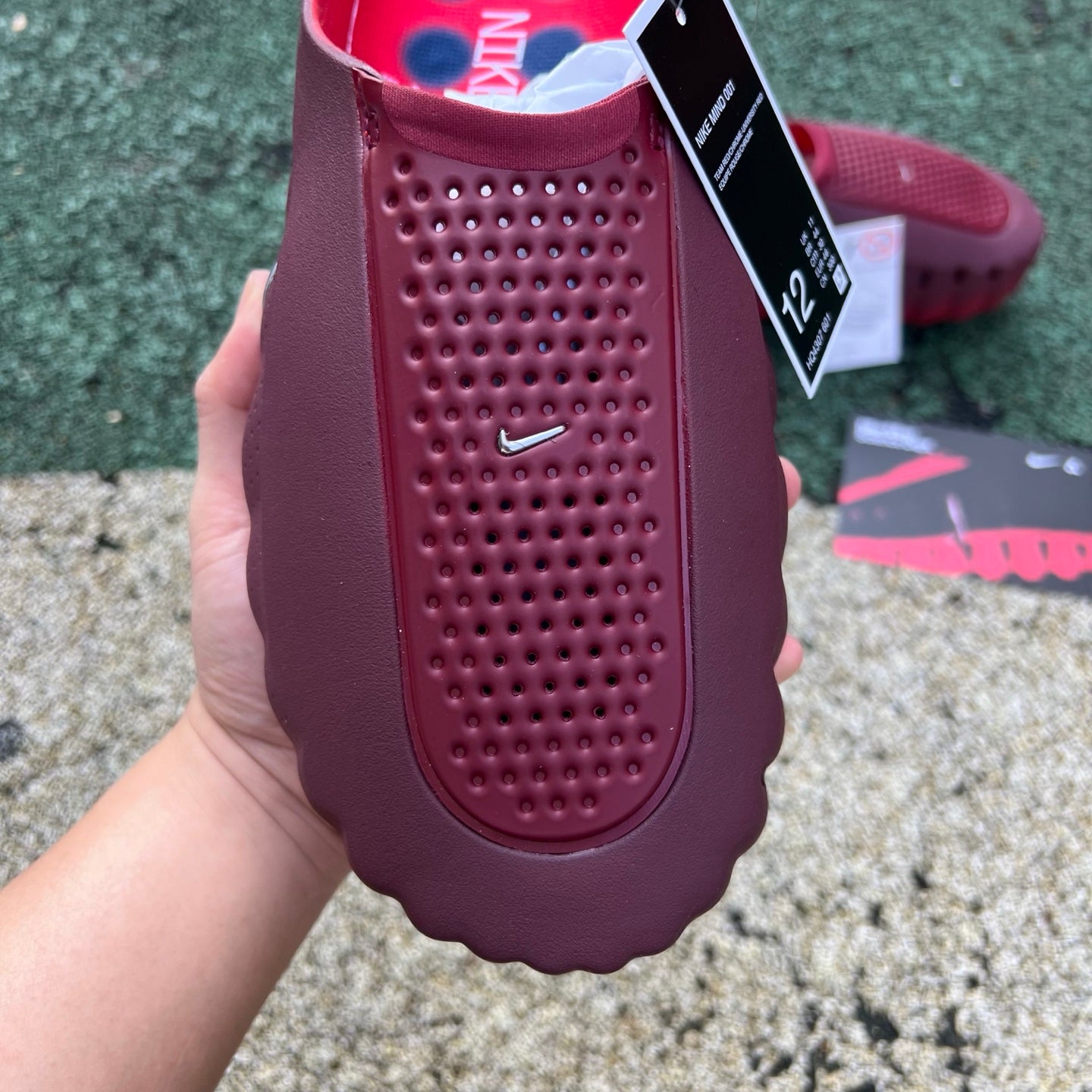 Nike Jordan Mind 001 Slide in team red and university red, featuring a comfortable slip-on design and sporty style.