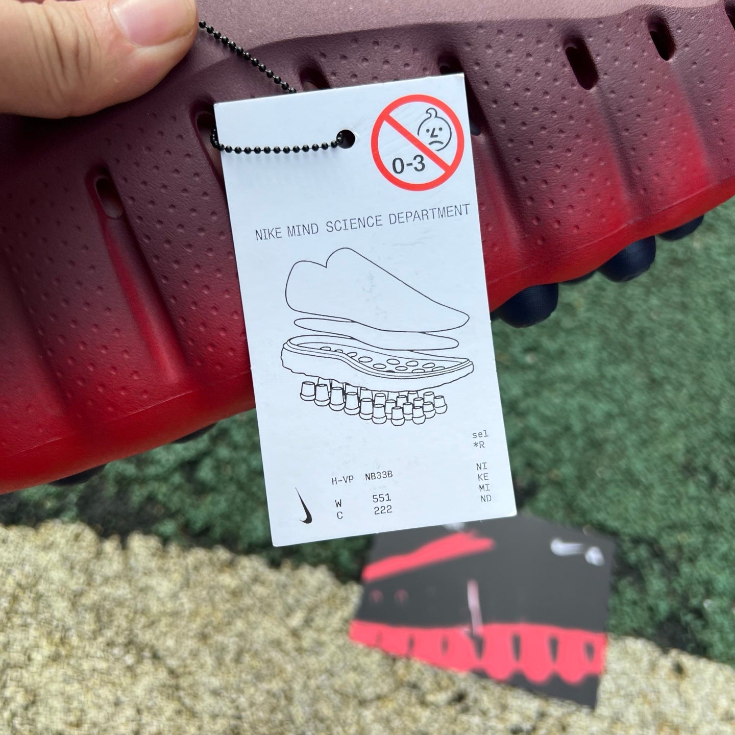 Nike x Jordan Mind 001 Slide in team red with white accents, showcasing a sporty slip-on sandal with cushioned footbed and logo details.