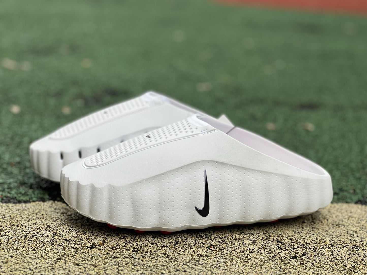 Nike x Jordan Mind 001 slide in white with red accents, featuring a sporty design and branded Nike and Jordan logos.
