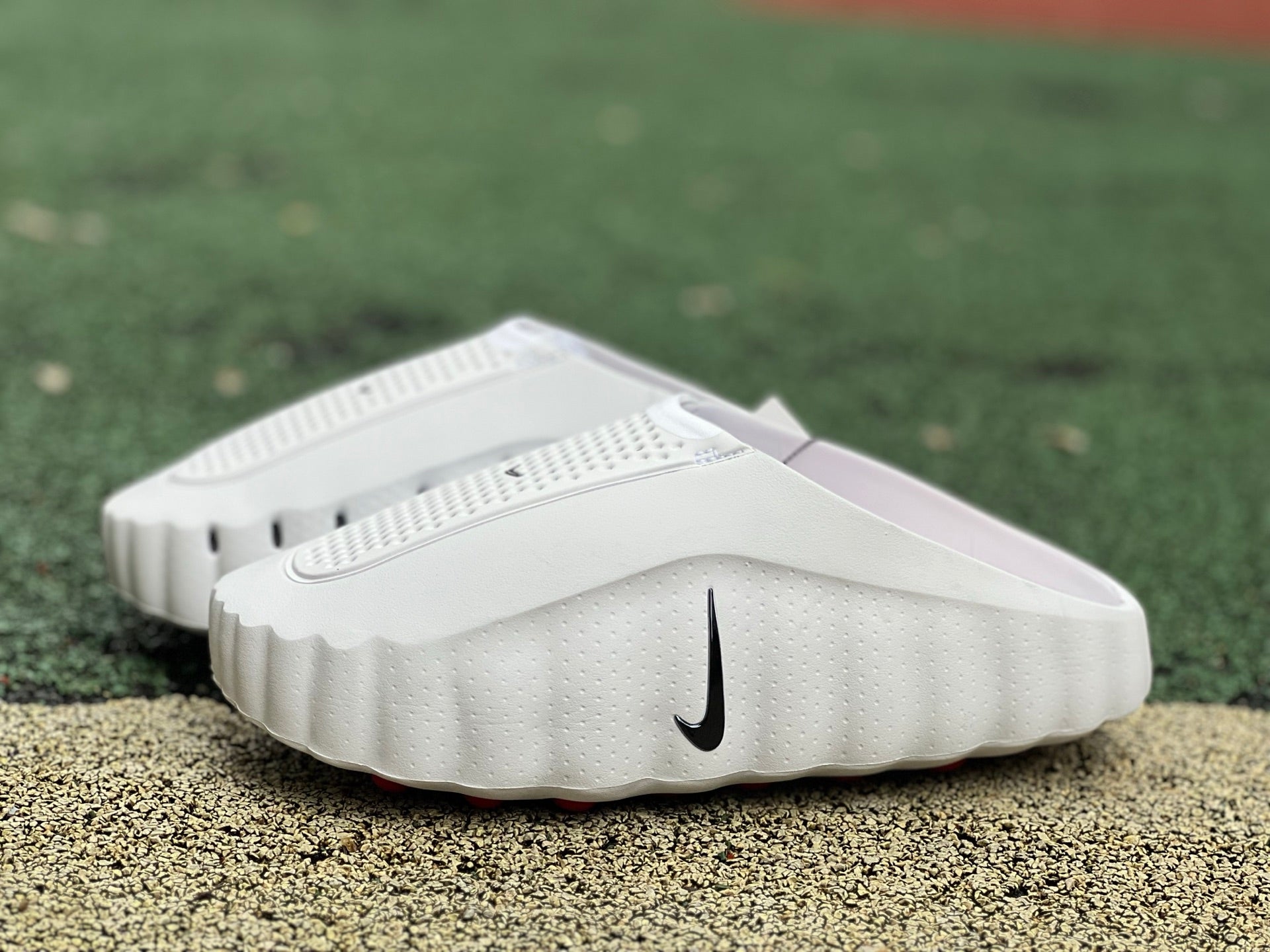 Nike x Jordan Mind 001 slide in white with red accents, featuring a sporty design and branded Nike and Jordan logos.