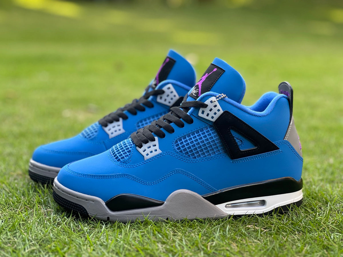Nike x Jordan Air Jordan 4 Retro Eminem Encore sneakers, featuring black and red design with signature details.