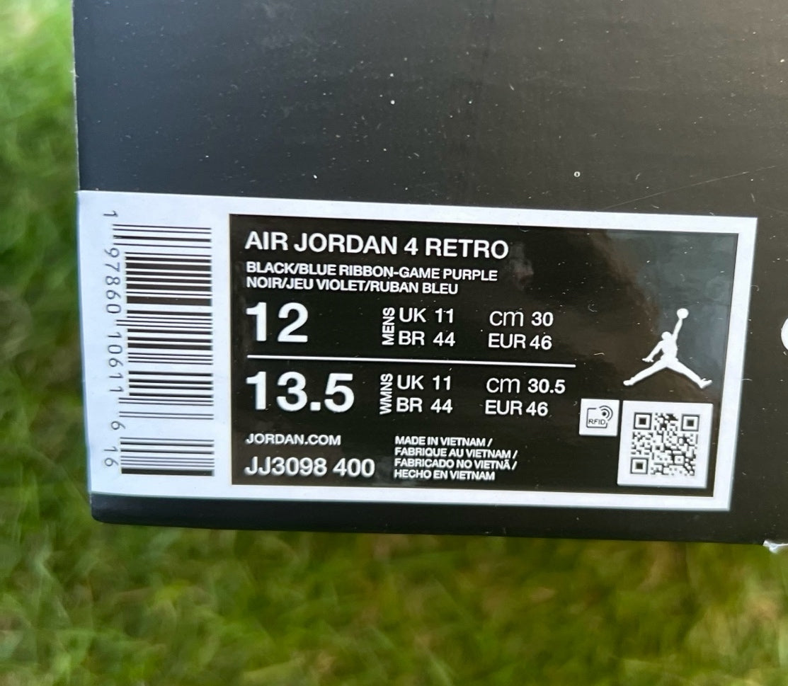 Nike x Jordan Air Jordan 4 Retro Eminem Encore sneakers featuring black and white colorway and signature design details.