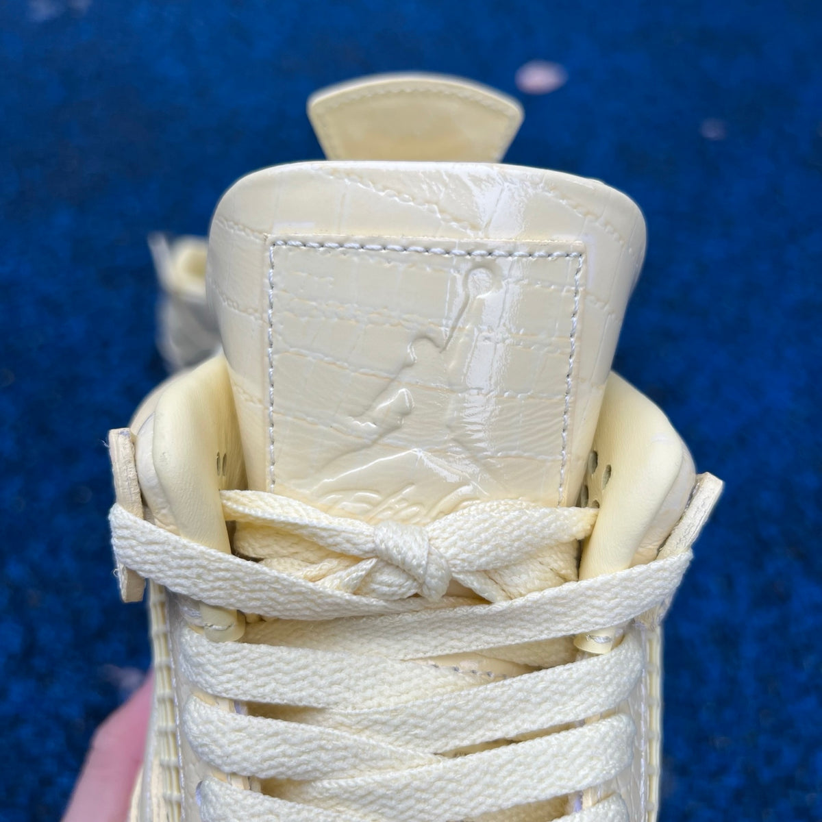 Nike Air Jordan 4 Retro J Balvin Lemonade sneakers with lime accents and stylish design, front view showing details.