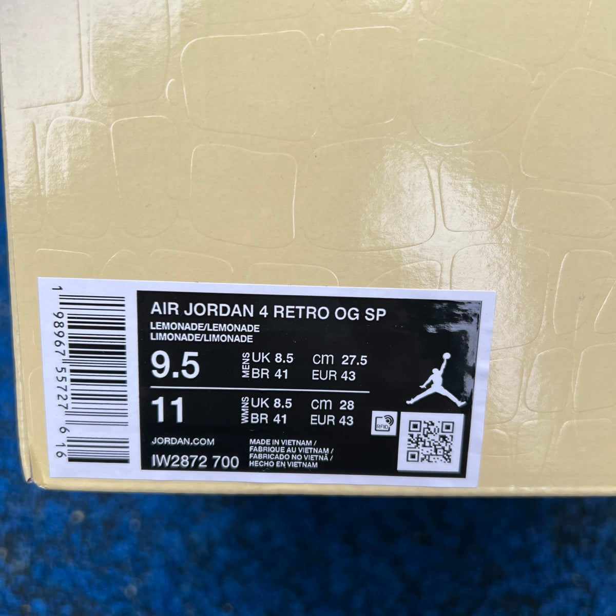 Nike Air Jordan 4 Retro J Balvin Lemonade sneakers, featuring vibrant yellow and black colorway and iconic Jordan design.