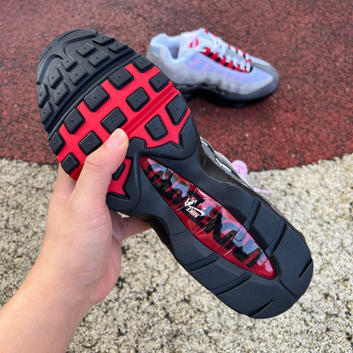 Nike Air Max 95 SP Undefeated Geo Tokyo Bright Crimson sneaker with bold color accents and distinctive design details.