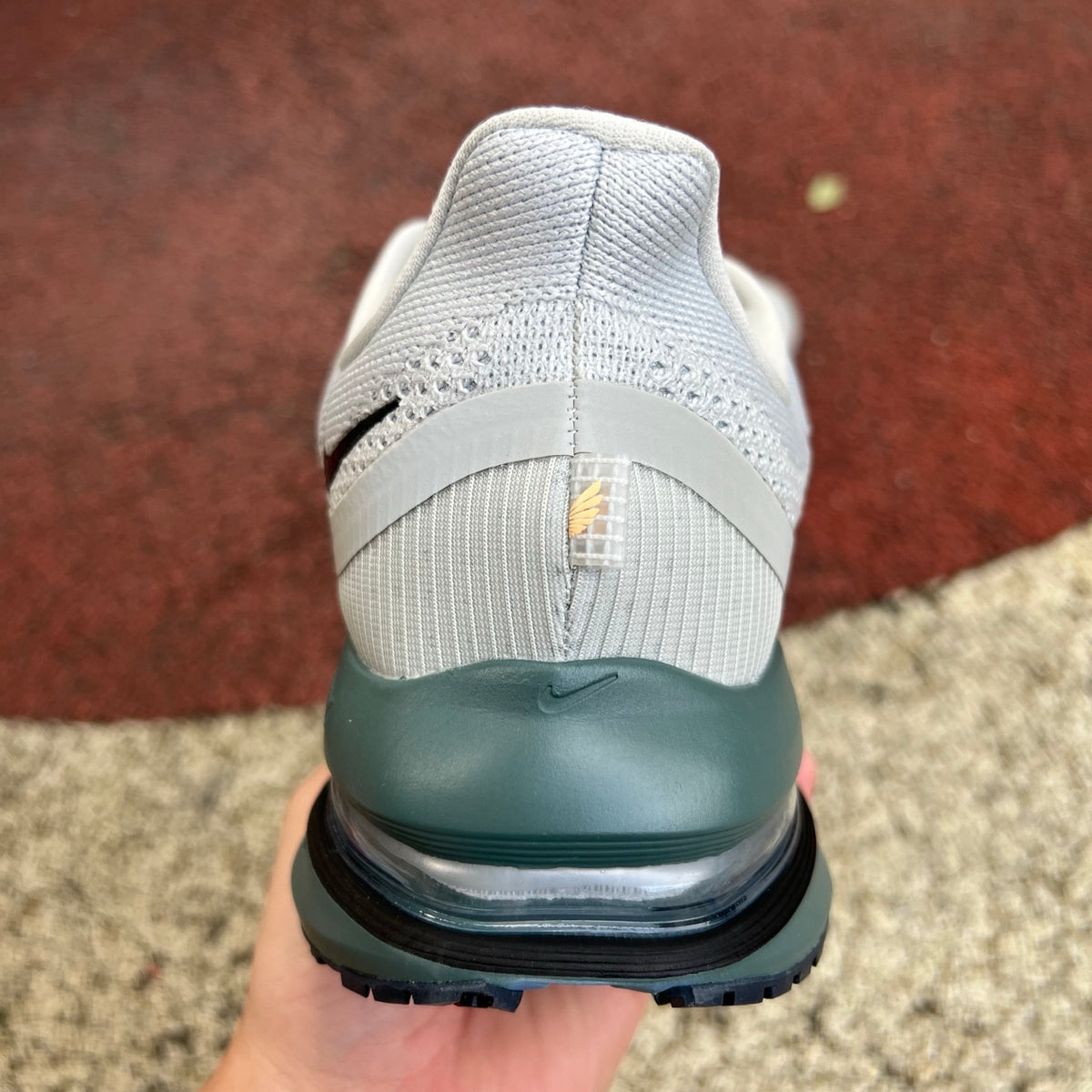 Nike Air Zoom Pegasus running shoes in grey mist, mineral slate, and dark obsidian, featuring Nike x Jordan branding.