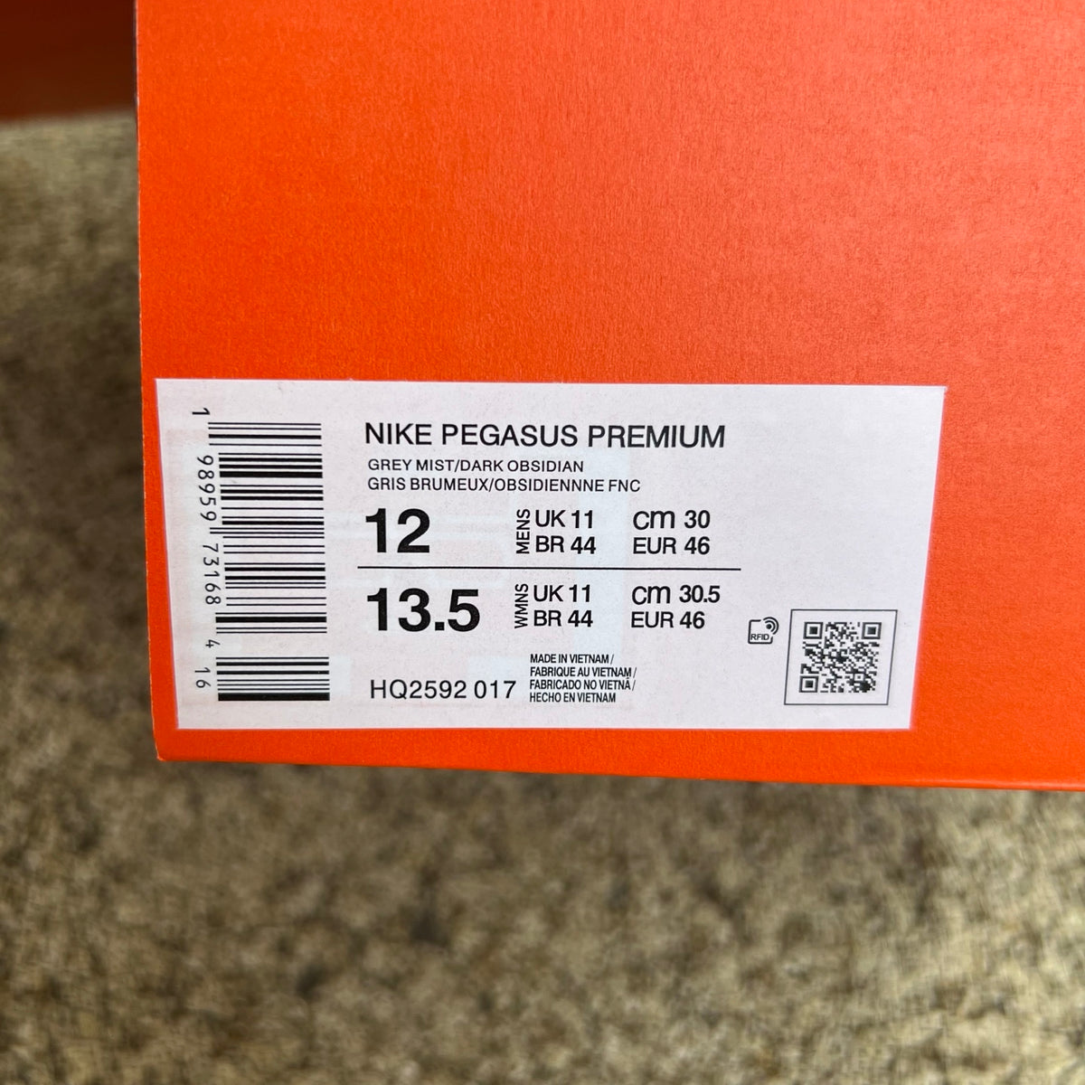 Nike Air Zoom Pegasus running shoes in grey mist, mineral slate, and dark obsidian with Nike x Jordan branding and sleek design